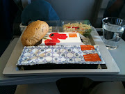 We are now in flight in KLM airlines to Amsterdam. Yummm. (photo )