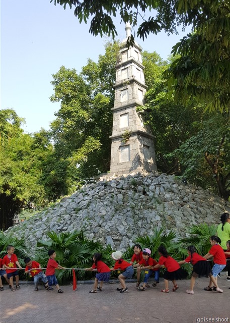 Hoan Kiem Lake. group of local school kids on a school outing. 