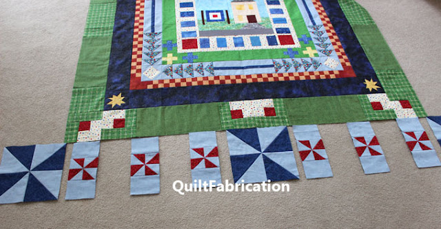 red and blue pinwheels on a quilt border