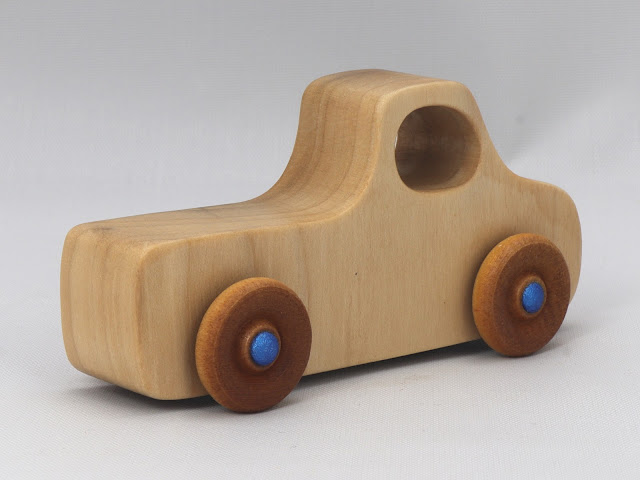 A handmade Wood Toy Pickup Truck from the Play Pal Series Finished with Clear and Amber Shellac