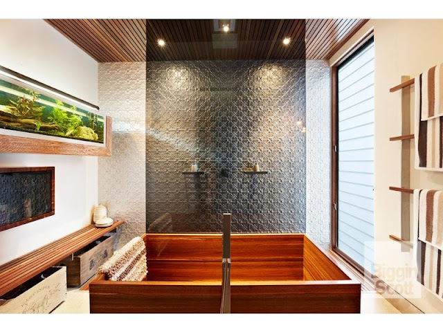 Photo of wooden bathtub in modern designed bathroom in Australian home