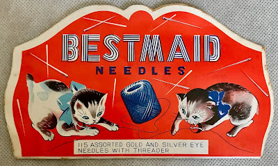 Vintage sewing needle package with kittens and pins and thread pictured on the front.