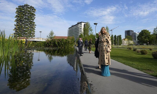 Queen Maxima wore a trench coat by Claes Iversen. Trench Pazia from Claes Iversen 2019 collection. Dries van Noten wide-leg pants