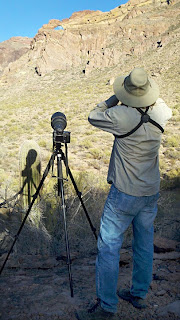 John watching moon through binoculars during interval photograph (c) Tracy Schiess