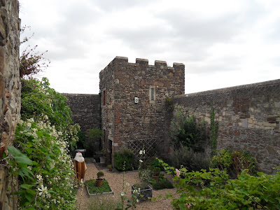 Mystery woman in garden of castle