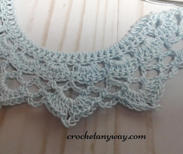 close up of crochet collar in blue cotton crochet thread