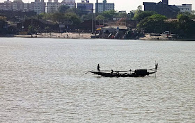 canoe silhouette Kolkata river