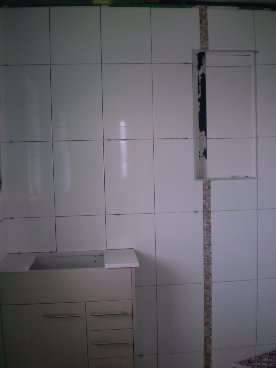 bathroom shower walls Bathroom + thin decorative tile strip. I am loving the niches they put 