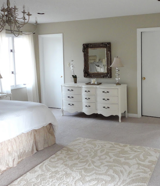 This is a really great budget bedroom makeover. Love the before and after pics!