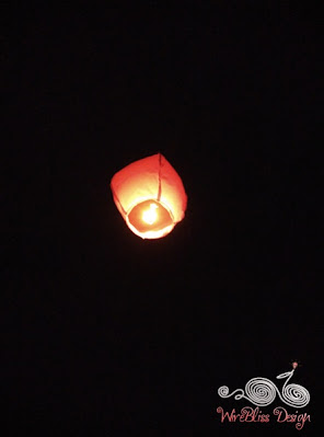 Lantern floating up further and further