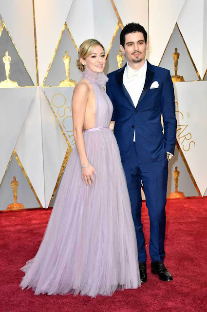 Damien Chazelle and Olivia Hamilton at 89th Annual Academy Awards