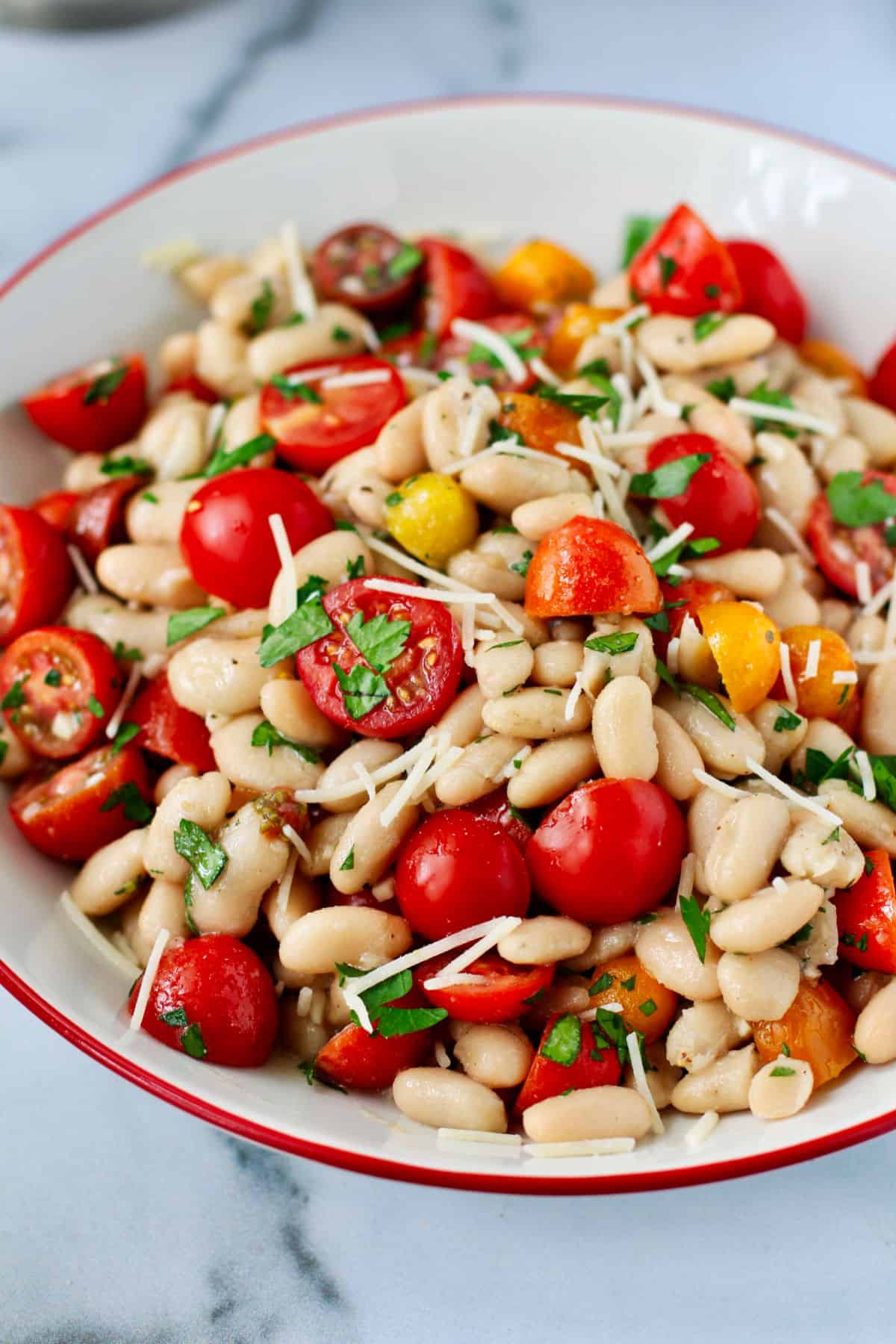White Bean and Cherry Tomato Salad with Parsley Vinaigrette in a large bowl.