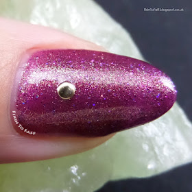 Gold and purple plum nail art stamped vortex.