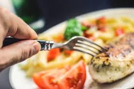 feel hungry. Hand fork dish meal food meat food hungry hunger