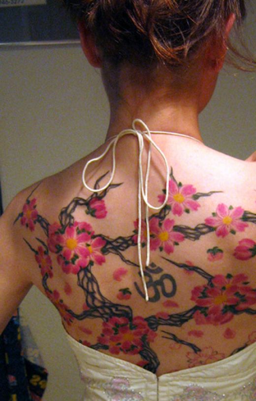 tattoos for girls on back. ack tattoos for girls. upper