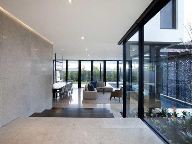 Photo of hallway leading into living room of amazing modern home in Melbourne