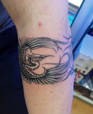 A cool phoenix tattoo design There is also a collection of phoenix tattoos 
