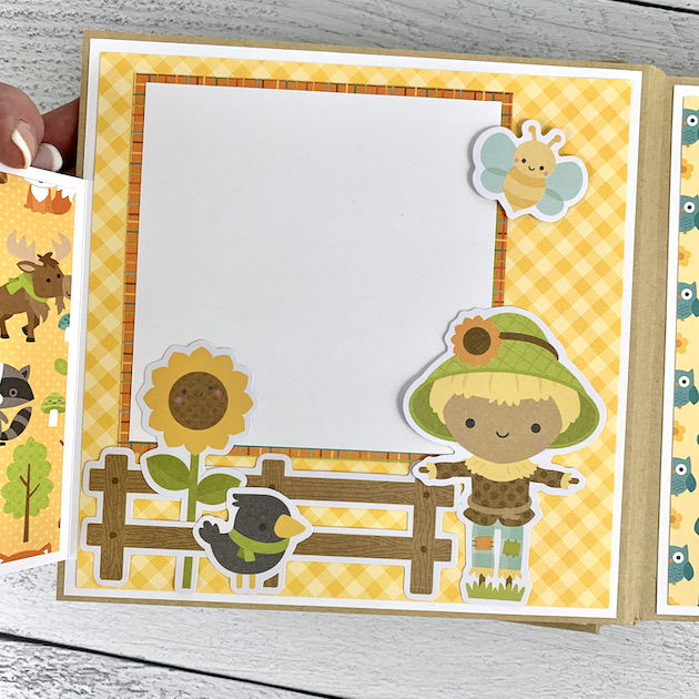 Fall Scrapbook Album Page with pretty warm colors, a scarecrow, & a sunflower