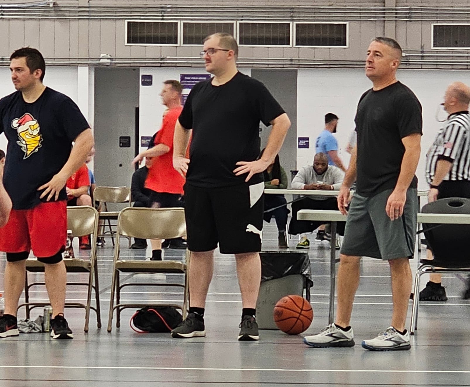 men on a basketball court