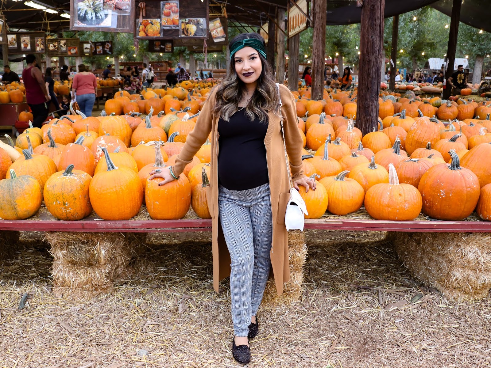 Yucaipa Live Oak Fall Pumpking patch outfit with long camel cardigan and plaid leggings