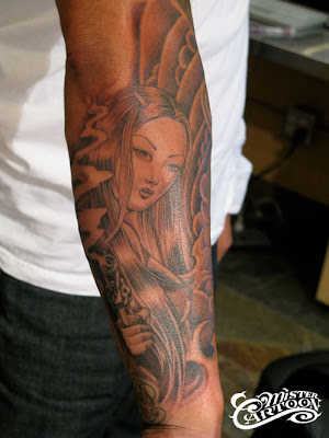 HERE IS ONE OF A JAPANESE INFLUENCED TATTOO WITH AN LA TWIST