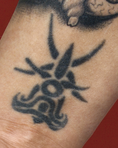 Tattoos Design on Wrist Tribal Tattoo