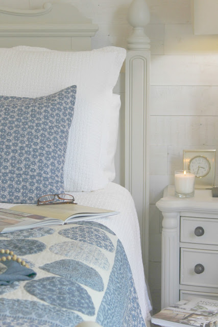 Beautiful blue moon quilt in bedroom with romantic country decor by Hello Lovely Studio