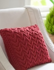 http://www.yarnspirations.com/pattern/knitting/christmas-cables-pillow