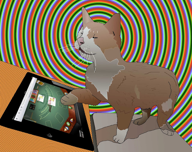 cat playing ipad blackjack