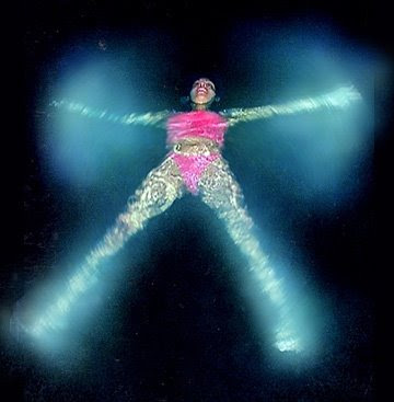 Bioluminescent Bay Image of a Girl Swimming