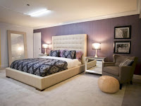 Bedroom accent wall with shade of purple from lighting