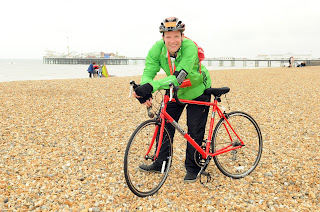 a picture of Roberto from Heart FM at the finish of the London to Brighton