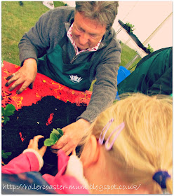 Alan Titchmarsh helping plant strawberry plants at the Royal School's Grow For It