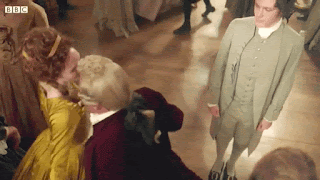 Demelza Poldark looks beautiful dancing at the ball while Elizabeth Poldark and her mother and her friends watch her.