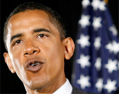  President Obama, and surrounded by American flags