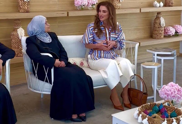 Queen Rania wore a manrola striped cotton poplin shirt by Silvia Tcherassi. Jordan River Foundation Al Karma Kitchen projects