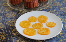 Food Lust People Love: Candied lemon slices are beautiful perched atop a cake but we have been known to eat them as is. They are a lovely combination of tart and sweet and they are wonderfully sticky.