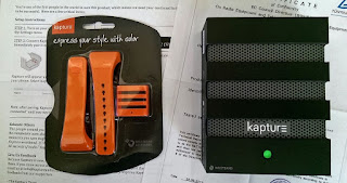 Kapture device in box with optional orange strap