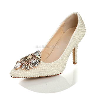 http://www.dressfashion.co.uk/product/women-s-ivory-patent-leather-pumps-with-rhinestone-pearl-ukm03030441-13314.html?%20Utm_source%20=%20minipost%20&%20utm_medium%20=%201264%20&%20utm_campaign%20=%20blog