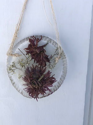 Ice Disk with Flowers by Front Door