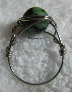 wire wrapped ring with green stone (no name)