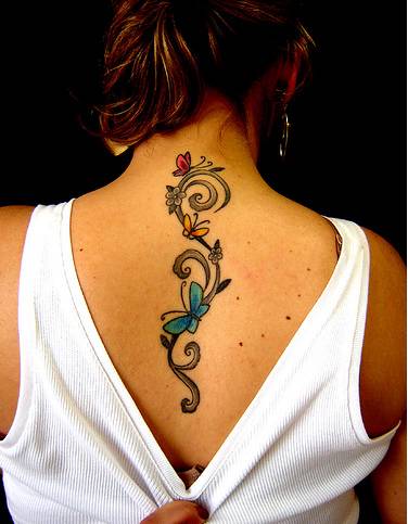 Best flower Tattoos For Women- upper backTattoo Designs