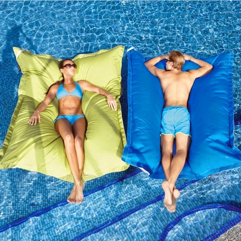 10. The most luxurious plastic pool rafts ever. These are not some dinky plastic pool toys here.  These are king-size plush beds made to float above clear blue waters. - 21 Places to Take a Nap Straight Out Of Your Fantasies