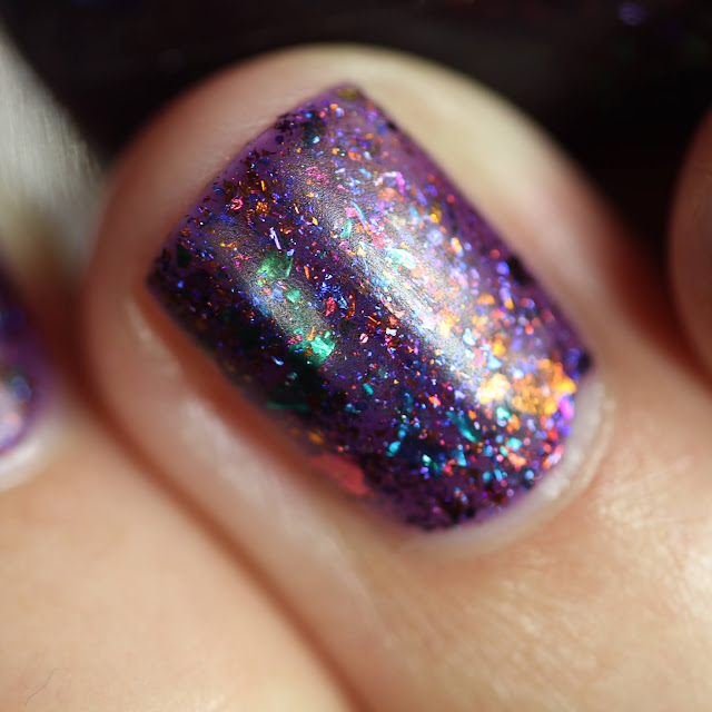 purple nail polish with multi chrome flakes matte