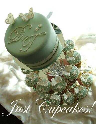 Wonderful green and white wedding cupcake inspiration with silver cupcake