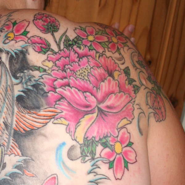 flower in my back piece tattoo Flower Tattoo Designs The Most Beautiful