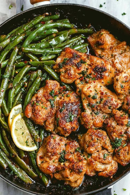 Lemon Garlic Butter Chicken Thighs and Green Beans Skillet – So addicting! This paleo, low carb, keto-friendly skillet chicken recipe is a snap to fix and cook.