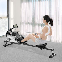 MaxKare Water Rower Rowing Machine in action, image