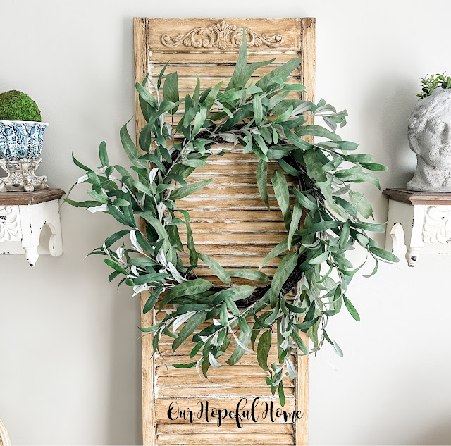 eucalyptus leaf wreath on vintage shutter