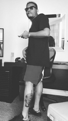 https://dab247.blogspot.com/Olamide shows off his Oduduwa leg tattoo